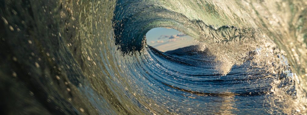 A beautiful wave at sunset on the beach in Australia