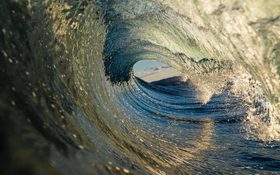 A beautiful wave at sunset on the beach in Australia