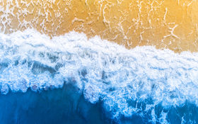 A bird view of the beach and ocean in Palm Coast, United States