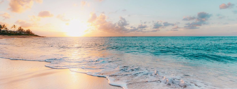 Atlantic ocean waves during golden sunset in Cape Cod, Massachusetts, USA