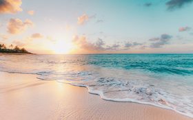 Atlantic ocean waves during golden sunset in Cape Cod, Massachusetts, USA