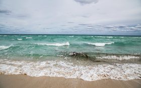 Beautiful waves of a sandy beach in Miami Beach, Florida