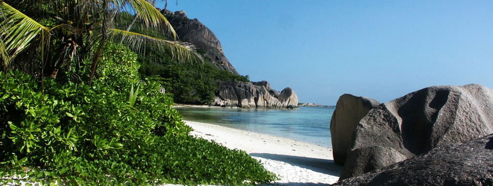 Big Stones And White Sand Beach Background