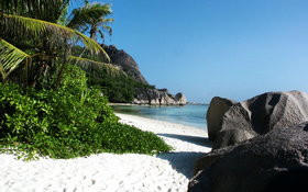 Big Stones And White Sand Beach Background