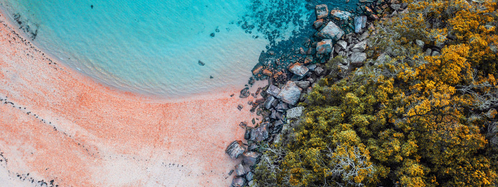 Blue water, sand rocks and amazing colors of nature in Manly, Sydney, Australia