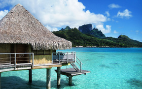 Bora Bora bungalow resort on the beach wallpaper