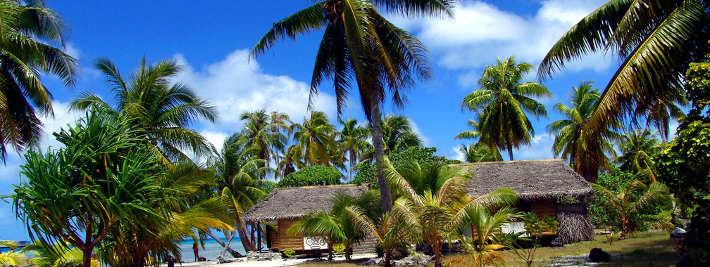 Bungalows On The Sandy Beach Wallpaper