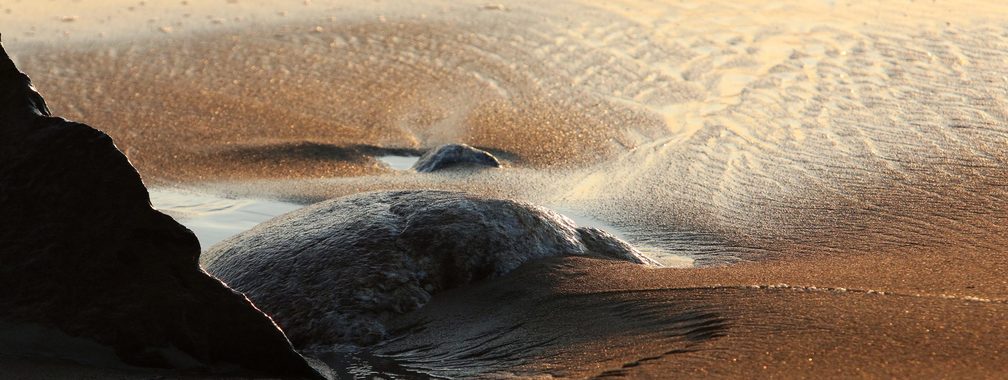 Close up surface of sand on the beach in the Hampton Beach