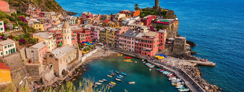 Colorful houses along the coastline in Vernazza, Italy