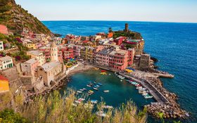 Colorful houses along the coastline in Vernazza, Italy