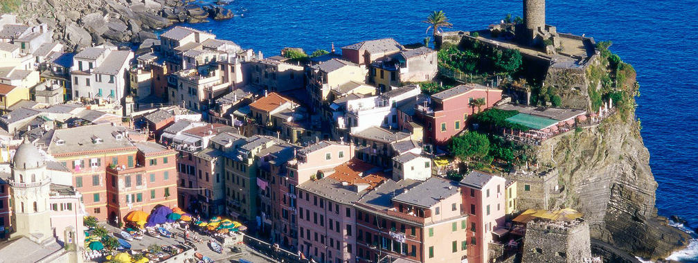 Colorful houses along the coastline in Vernazza, Italy