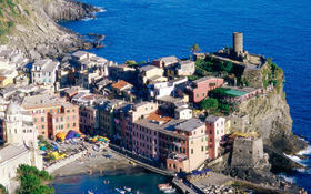 Colorful houses along the coastline in Vernazza, Italy