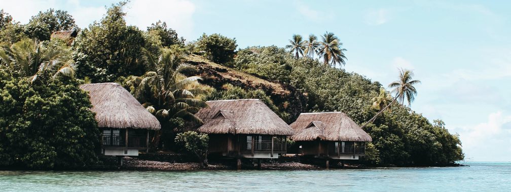 Cozy small bungalows off the coast of French Polynesia