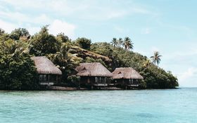 Cozy small bungalows off the coast of French Polynesia