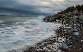 Crashing waves around Comox beach, Canada