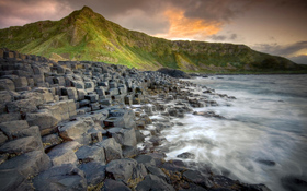 Great rocks standing on the beach wallpaper