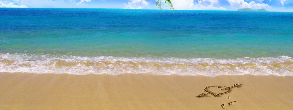 Love heart on beach sand