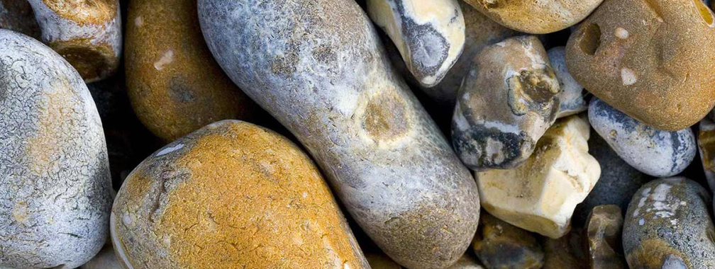 Nice pebbles on the beach background