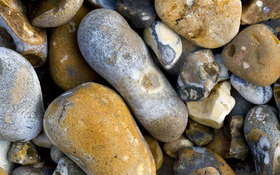 Nice pebbles on the beach background