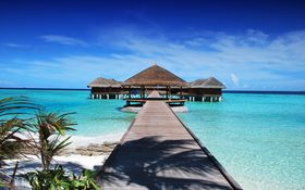 Overwater wooden bungalows in the Maldives