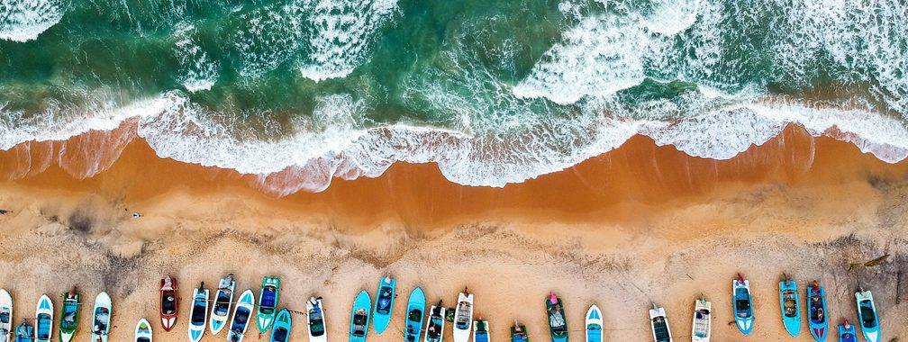 Small boats and great waves at Arugam Bay, Sri Lanka