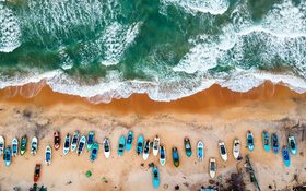 Small boats and great waves at Arugam Bay, Sri Lanka