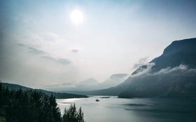 Small clouds over Saint Mary Lake, United States