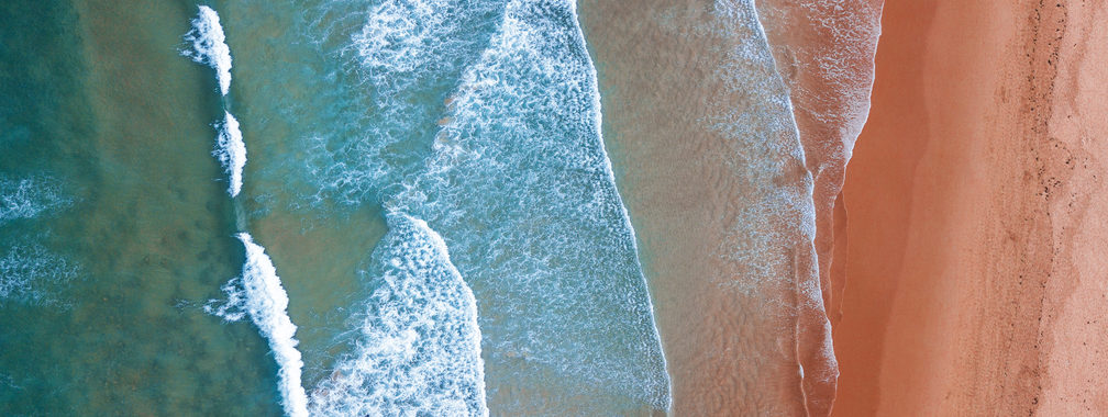 Stunning stretch of sand with crystal clear waters at Sardinero beach, Spain