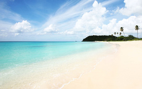 Sunny beach and crystal blue sea