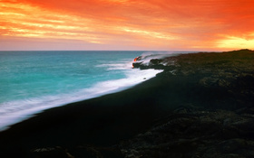 Sunset over a lava fields in Hawaii wallpaper