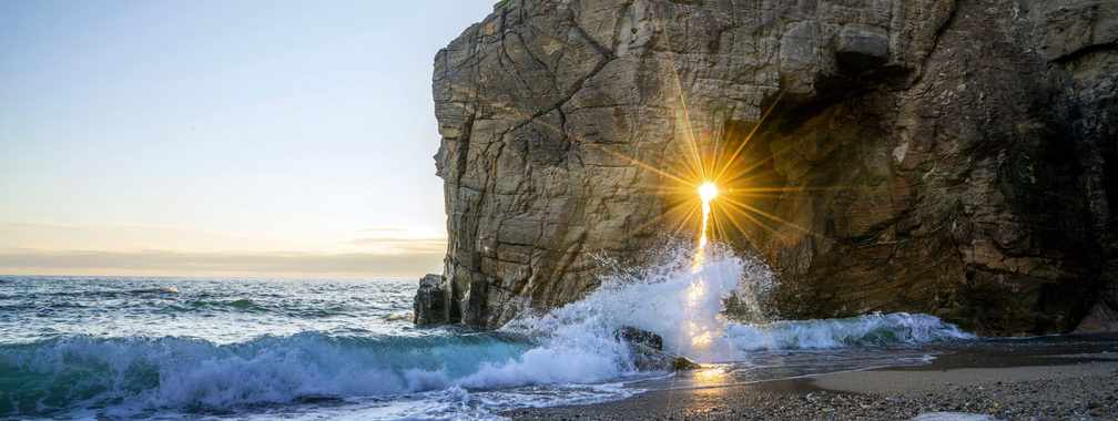 Sunset through the stone in Brittany, France