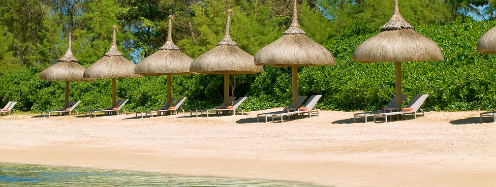 Thatched umbrellas on the Mauritius beach