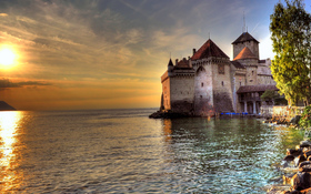 The charming beach of Chillon Castle, Lake Geneva