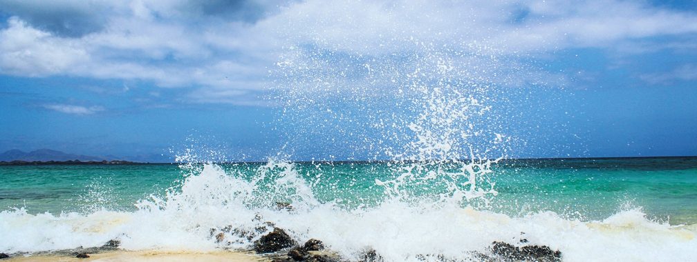 The pristine coastline with emerald green waters in Fuerteventura, Spain