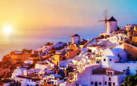 The spectacular sunset over the Oia village in Santorini, Greece