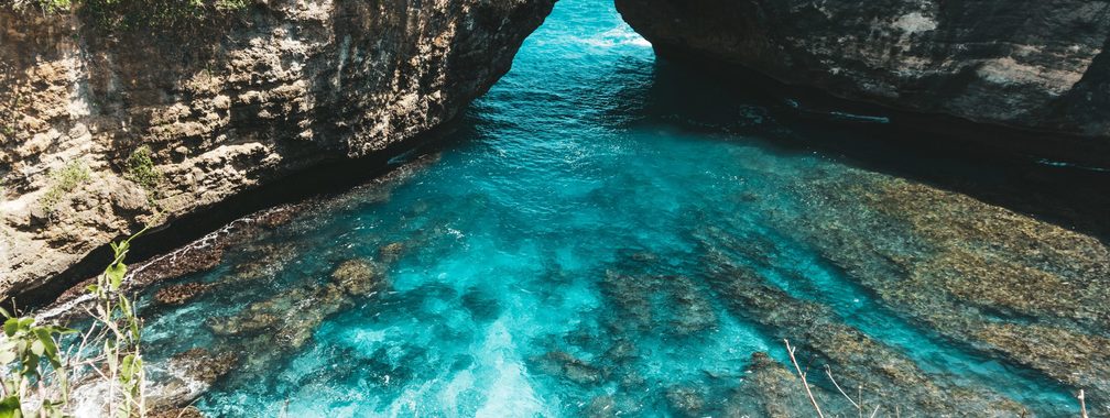 Unique cliff formations and lagoons at Broken Beach in Nusa Penida Island