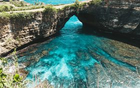 Unique cliff formations and lagoons at Broken Beach in Nusa Penida Island