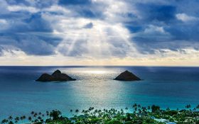 Water sky clouds at Lanikai Beach overlooking the Twin Makulua Islands